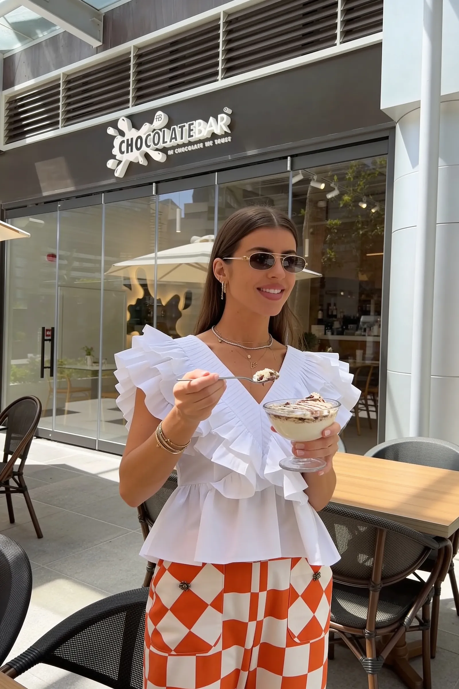Guest enjoying a ChocolateBar drink at an outdoor table